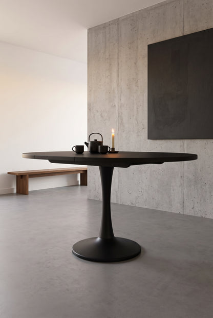 Table ovale extensible noire 100 à 140 cm, mécanisme télescopique, en situation