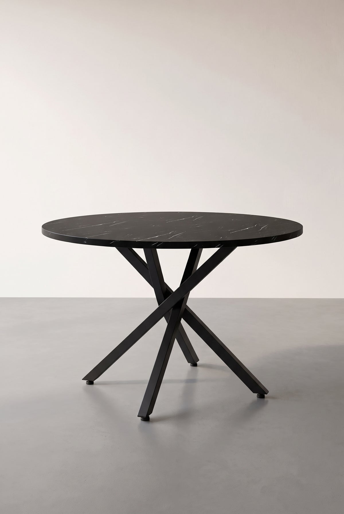 Table ronde extensible 100 à 140 cm, aspect marbre et métal noir, vue d'ensemble